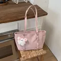 Pink glossy tote bag with vertical stripes and a cute plush bear charm for daily commuting - No Pendant / Pink