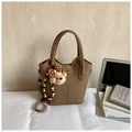 Brown litchi grain bucket bag with handles and a cute plush bear charm for women - Khaki With Rabbit Pendant