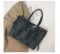 Large capacity dark grey tote bag with textured finish and black handles for daily commute - Black