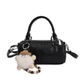 Black textured cylinder handbag for women with plush gnome and beaded charm - Black With Pendant