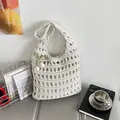 Beige handmade crochet tote bag with hollow knit design and tulip pendant decoration - White