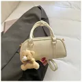 Chic beige Boston handbag in wrinkled leather with a cute plush bear charm - Off-White with Pendant