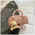 Pink textured leather Boston bag with a teddy bear charm and gold Miqier logo - Pink With Pendant