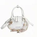 Borsa a tracolla ovale in pelle bianca minimalista con ciondolo intrecciato e manici - Argento