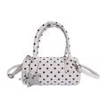Chic white polka dot barrel handbag with dual handles and star charm accessory - White