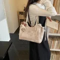 Beige canvas tote bag with geometric print, side drawstring, and cute bear pendant charm - With Pendant / Off White