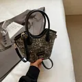 Sac seau tissé gris chic avec poignées en cuir noir et détails dorés brillants - Noir Sans Pendentif