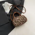 Zebra pattern faux fur mini bowling bag with brown leather handles and shoulder strap - No Pendant / Brown