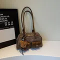 Vintage brown Boston handbag with double front pockets and plush bear charm - No Pendant / Coffee