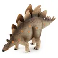 Detailed macro view of Stegosaurus dinosaur toy with realistic scale textures and orange spots - Brown