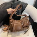 Brown oil wax leather motorcycle bag with multi-pocket design and glossy finish - Dark Brown