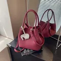 Burgundy lychee grain leather bucket bag with top handles and cute elephant charm - Burgundy
