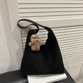 Minimalist black suede hobo bag with a cute brown plush puppy charm decoration - Black (With Charm)