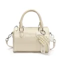 Chic cream Boston handbag in crinkled patent leather with a pearl heart charm - With Pendant / White