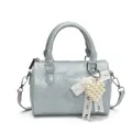 Light blue patent Boston bag with pearl heart pendant and elegant shoulder strap - Blue