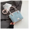 Sac seau en denim bleu avec lanières en cuir rose et strass scintillants - Aqua