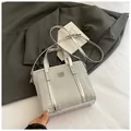 Chic silver glitter bucket bag with wavy texture and detachable shoulder strap - Large No Charm Silver Wave Texture