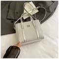 Silver woven texture bucket bag with metallic trim and adjustable crossbody strap - Large No Charm Silver