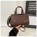 Classic dark brown PU leather Boston handbag with gold hardware and adjustable strap - Brown without Charm