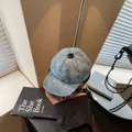 Blue denim baseball cap shaped crossbody mini coin purse with woven shoulder strap - Classic Cowboy Style / Light Blue