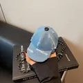 Creative light blue denim baseball cap mini crossbody coin purse with woven lanyard - Distressed Denim Style / Blue