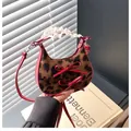 Mini borsa a tracolla in ecopelliccia leopardata con fiocchi in pelle rossa eleganti - Leopardato Rosso