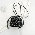 Fashion black sequin drawstring bucket bag with leather strap and shimmering glitter - Silver
