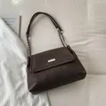 Minimalist chocolate brown suede shoulder bag with rectangular silver buckle and chain strap - No Pendant / Brown