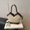 Chic beige quilted bucket bag with brown leather trim and golden logo detail - Rice White (No Pendant)