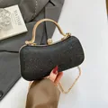 Schillernde schwarze Glitzer-Clutch mit goldenem Metallgriff und Juwelen-Verschluss - Schwarz