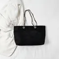 Elegant black quilted suede tote bag with metal chain strap for high-end styling - Black