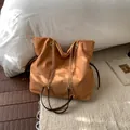 Vintage brown suede tote bag with golden chain strap and drawstring side details - No Pendant / Brown