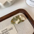 Green and white marble cloud hair clip with golden glitter and handmade acetate texture - Green Smudge