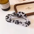 Elegant black and white marbled acetate claw clip with a wavy design for women - Black White Marble Cloud Hair Claw