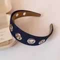 Cerchietto in denim blu scuro con occhielli in metallo e design stile punk traforato - Cerchietto in Denim Blu Profondo con Occhielli