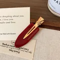 French vintage water drop acetate hair clip in deep burgundy resin with gold alloy base - Burgundy