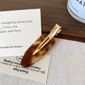 French vintage amber tortoise shell acetate hair clip with golden metal clasp - Mixed Brown