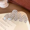 Eleganter gewellter Haarclip mit Silberglitzer, schwarzem Schmetterling und Karo-Muster - Welle Schwarz Schmetterling Gitter