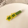 Fermaglio per capelli a stella verde e giallo in resina con clip a becco d'anatra dorata - Fermaglio Stella Gialla