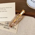 Acetate hair clip with beige marble texture and golden metal clasp for daily styling - Milky Brown