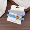 Set de pinzas para el pelo en acetato de mármol lila y lazo azul con pedrería - Azul