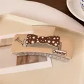 Brown plaid hair claw clip with star bow design and Character lettering for women - Light Coffee Bow Tie Square
