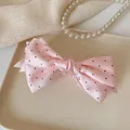 Rosafarbene Haarklammer mit Satin-Schleife, Polka-Dots und elegantem Glanz-Finish - Rosa gepunktete Schleife