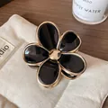 Elegant black floral hair claw with golden edges and vintage flower design for women - Black Flower Claw