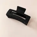 Matte black rectangular hollow geometric hair clip with minimalist matte finish - Black