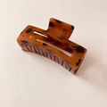 Classic tortoiseshell geometric hollow hair claw clip with vintage brown pattern - Dark Leopard Print