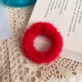 Plush faux rabbit fur hair tie in bright red color with a soft fluffy texture - Red