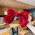 Elegant large red satin bow hair clip for women with a glossy finish and stylish design - Burgundy
