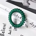 Coletero de espiral verde oscuro duradero con acabado mate y estilo minimalista - Verde Oscuro