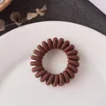 Elastic spiral hair tie in deep brown woven texture for ponytail styling - Dark Coffee